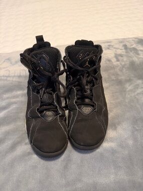 Nike Black High-Top Basketball Sneakers with Gold Accents